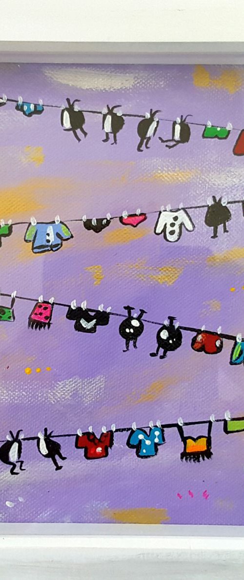 Purple Diagonal Laundry Televisions, framed by Maria Luisa  Azzini