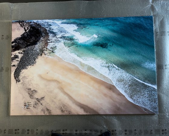 SURFERS ON THE BEACH