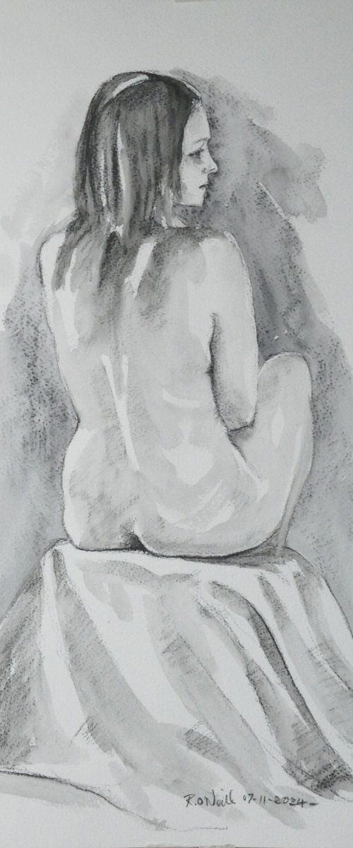 Seated female nude by Rory O’Neill