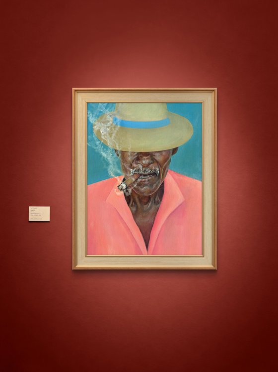 Smoking man in a hat
