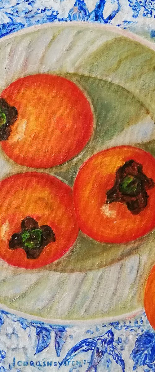 Plated Persimmons on Table by Katia Ricci