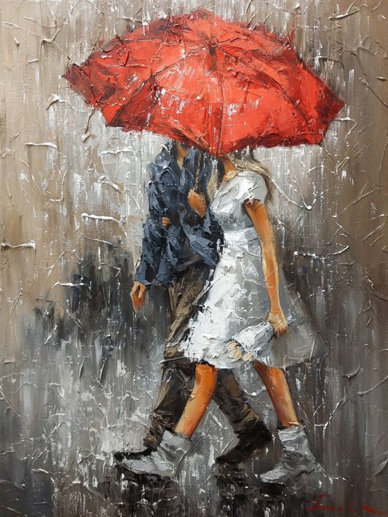 Together under red umbrella
