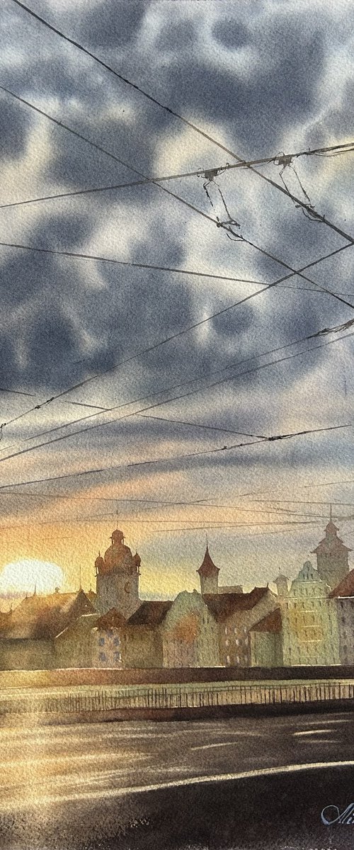Low sun over the city by Alina Karpova