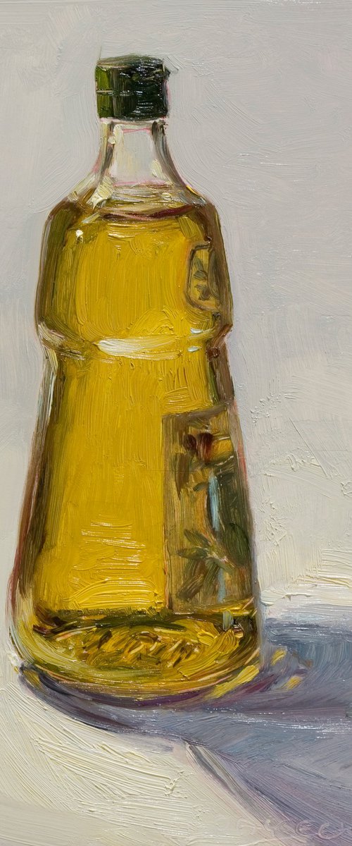oil bottle on white background by Olivier Payeur