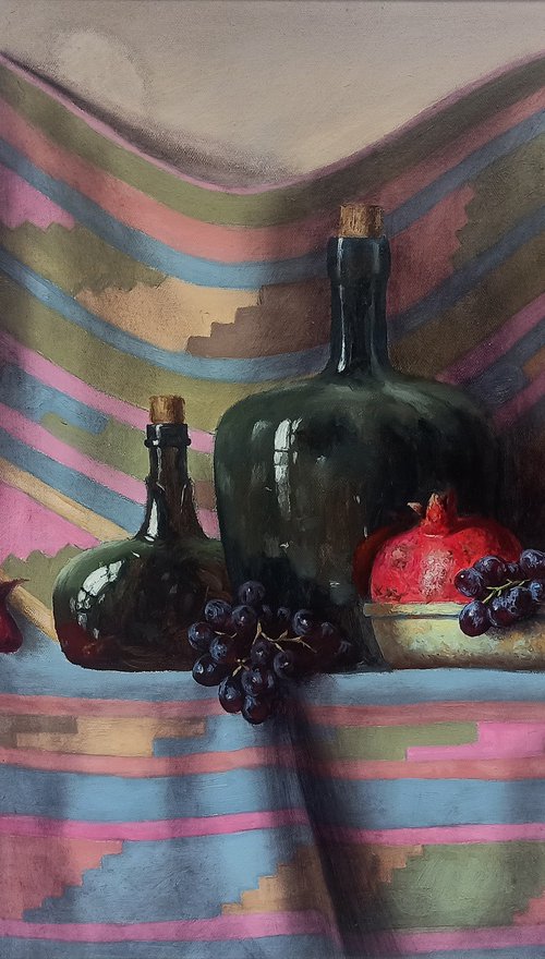 Still life with pomegranates and grapes by Arayik Muradyan