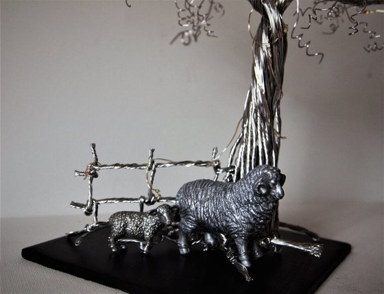 Tree with Sheep, fence and lights