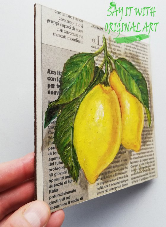 "Leafy Lemons on Newspaper"