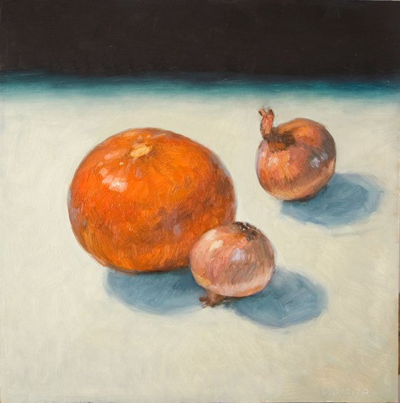 modern still life pumpkin and onions