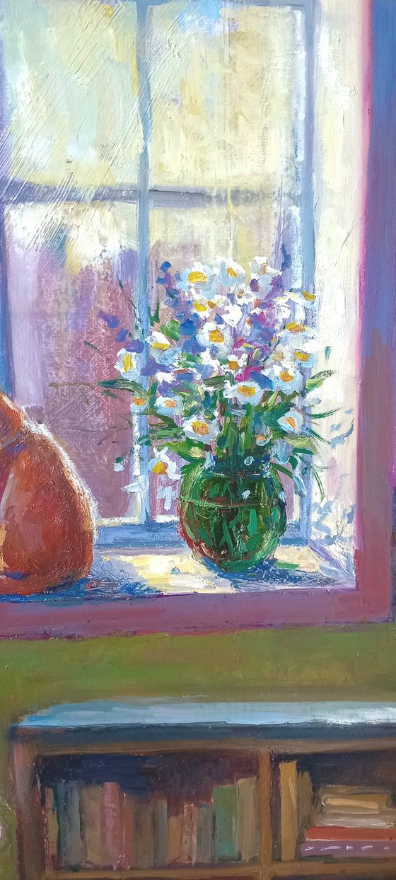 Ginger cat and armchair