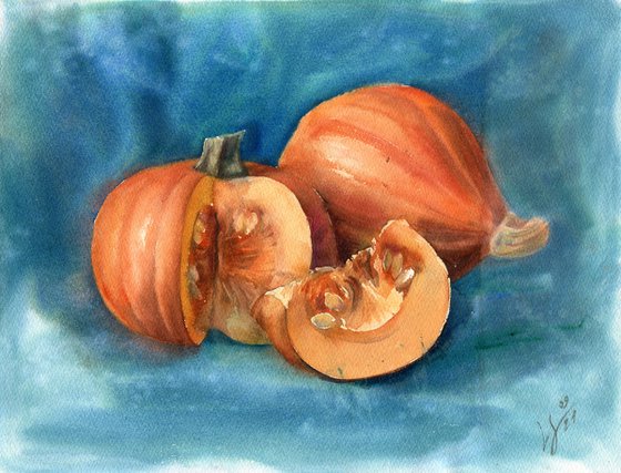 Still life with pumpkins on a blue background