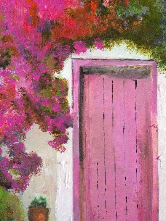 Mediterranean House with Pink Flowers