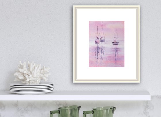 Sailboats on a pink sunset