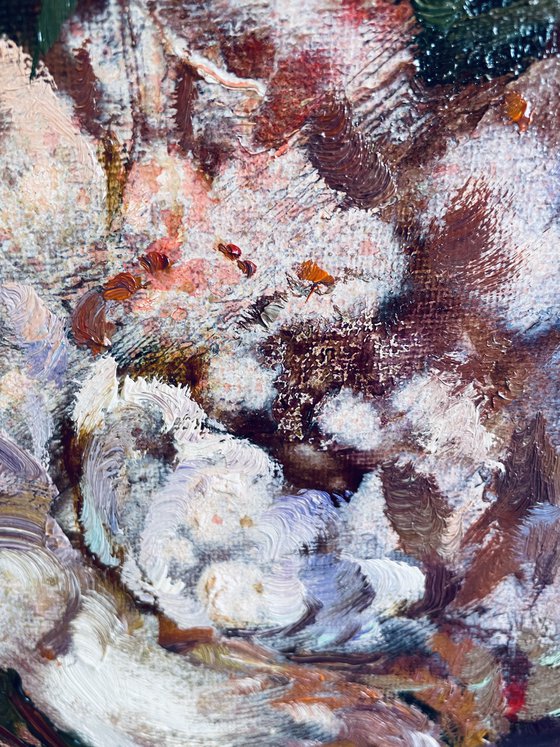 A lush bouquet in a pink vase