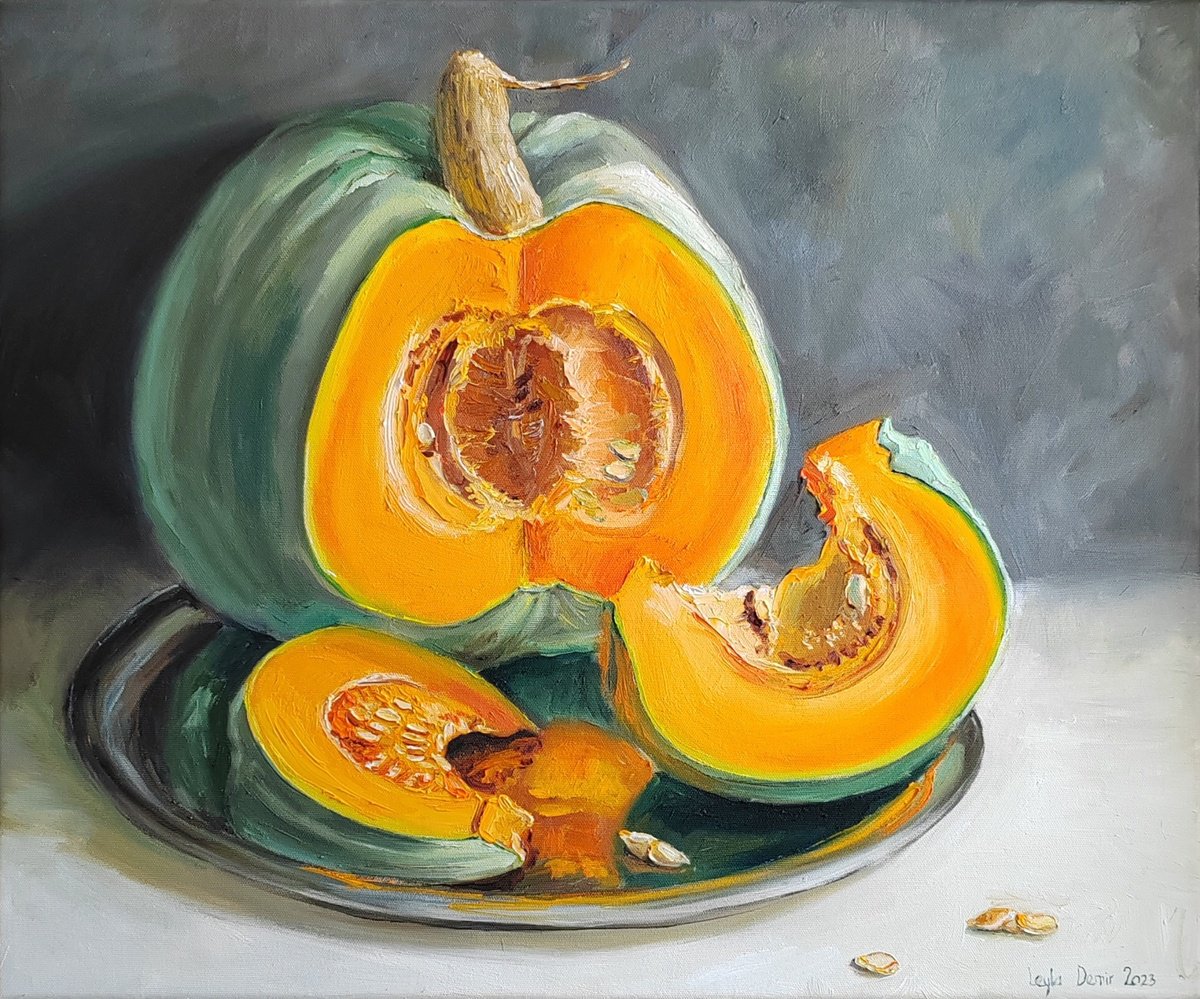 Pumpkin on metal tray by Leyla Demir