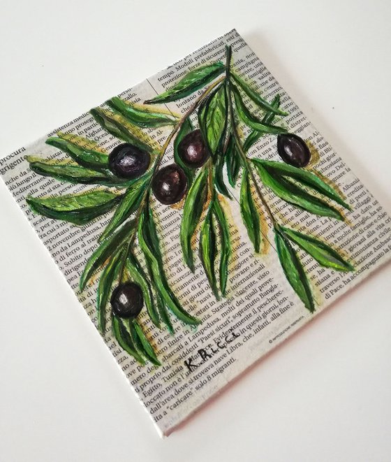 "Olives Branch on Newspaper"