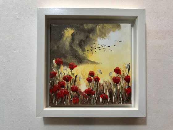 Poppies under a full moon in a frame