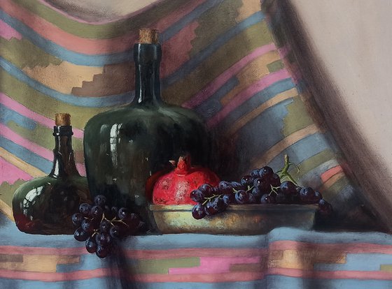 Still life with pomegranates and grapes