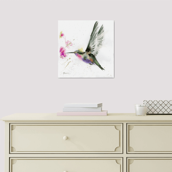 Hummingbird with flower