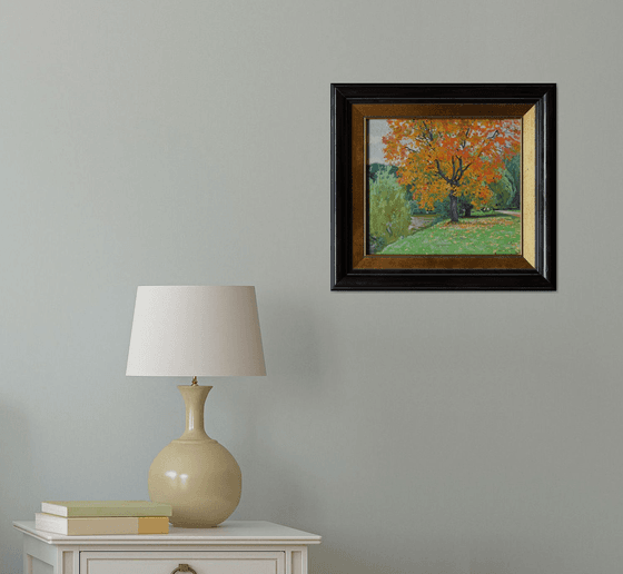 Autumn maple by the pond