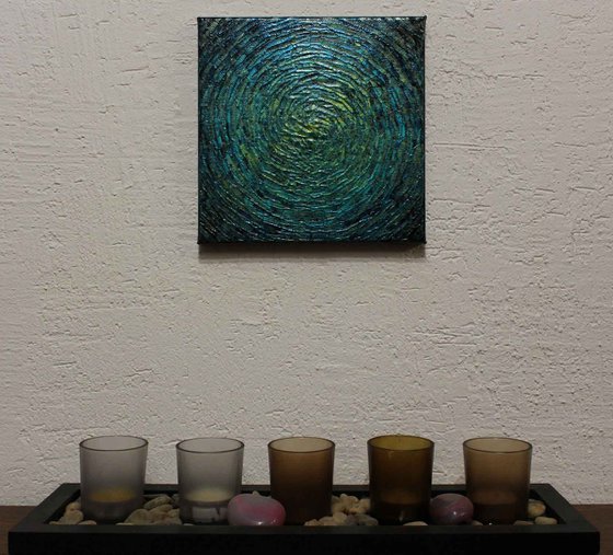 Small iridescent blue green shine