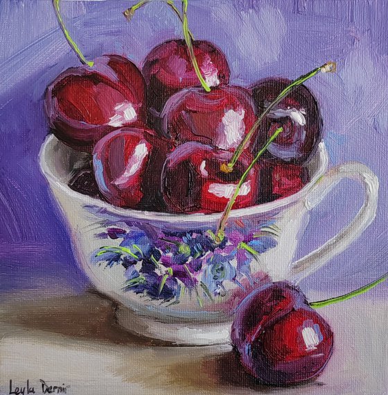 Cherries in porcelain cup