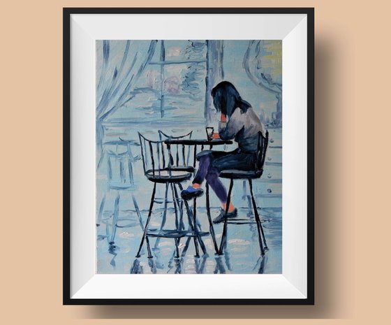 Woman in a cafe.