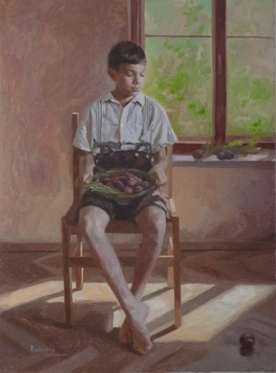 Boy with plums