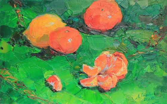 Tangerines on green