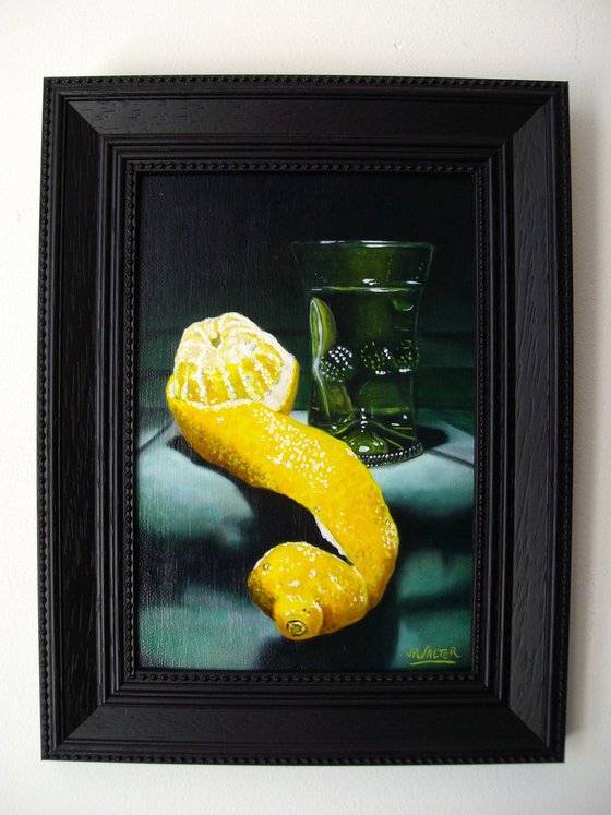 Peeled lemon with Römer glass