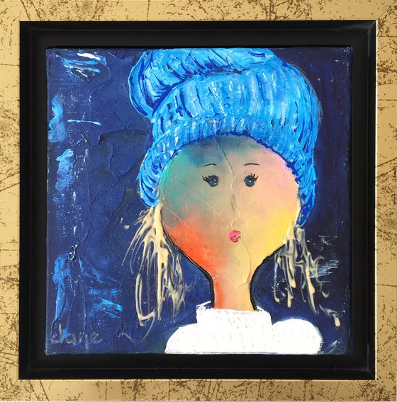 The girl with a woolen cap