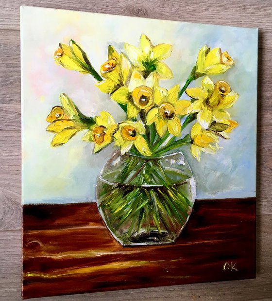 Bouquet of Daffodils #4 on wooden  table, still life inspired by spring in a glass.