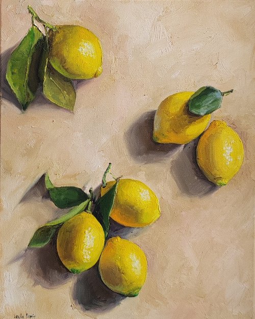 Lemon on cream background still life by Leyla Demir