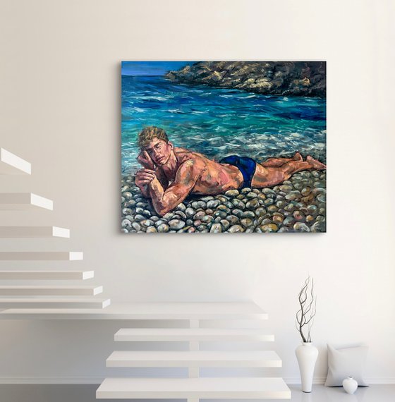Man lying down at the beach