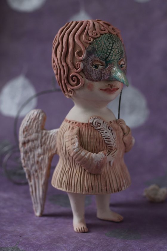 Angel with a mask. Ceramic OOAK sculpture.