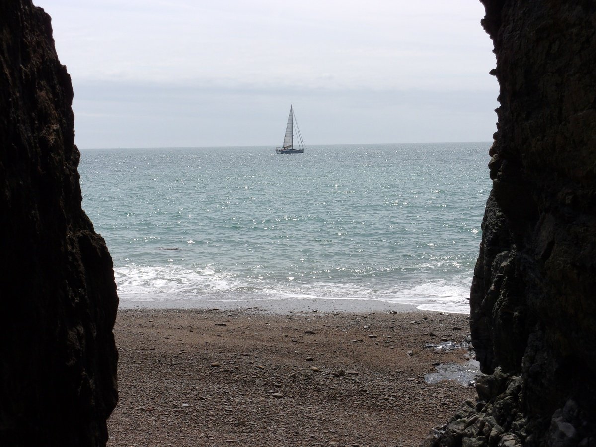 A sailing boat in Sark by Tim Saunders