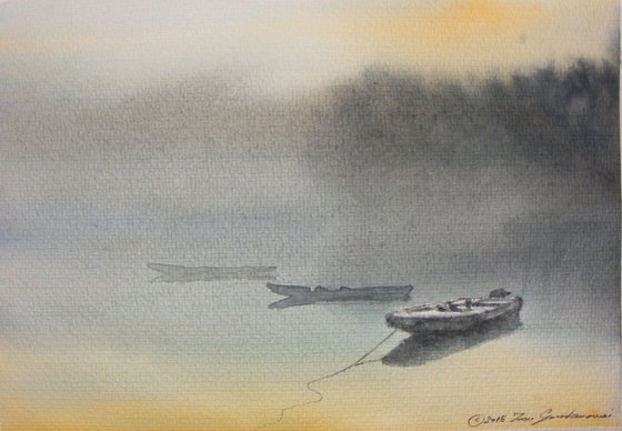 "Three boats in the morning mist"