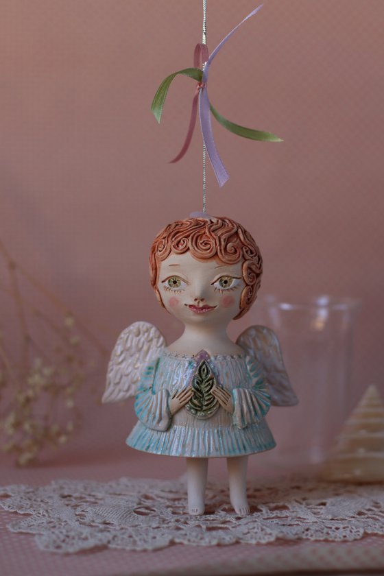 Tiny hanging sculpture. Angel