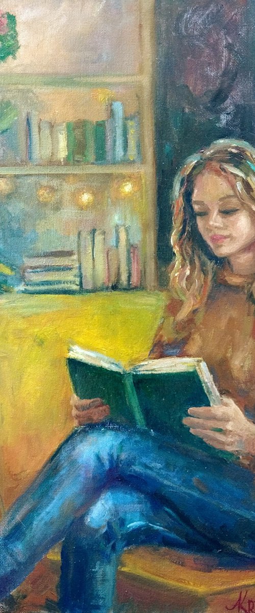 Reading a book by Ann Krasikova