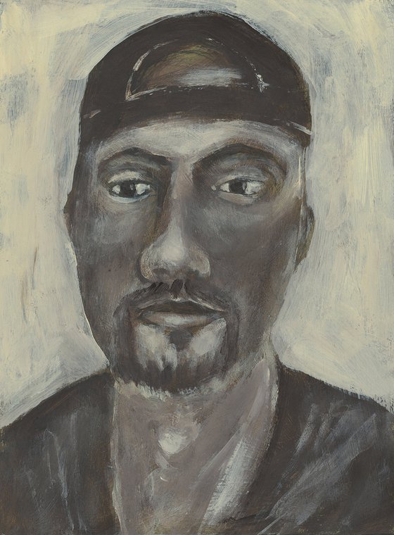 Portrait Of A Man In A Baseball Cap