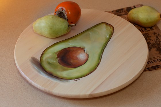 Rotating round wooden tray with avocado