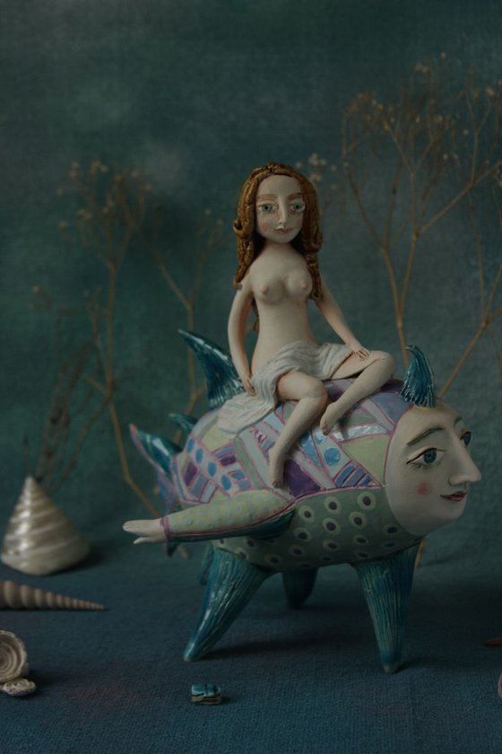 Girl riding the moon fish. Sculpture by Elya Yalonetski, 2018