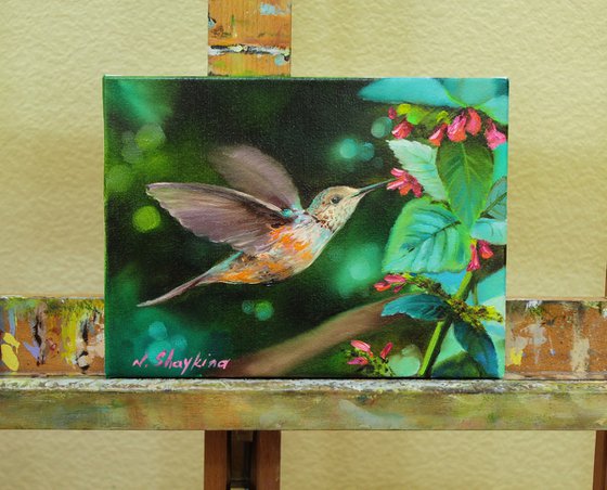 Hummingbird and Red Flowers
