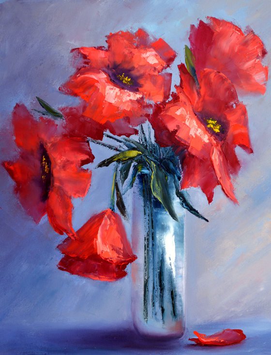 Red poppies on blue