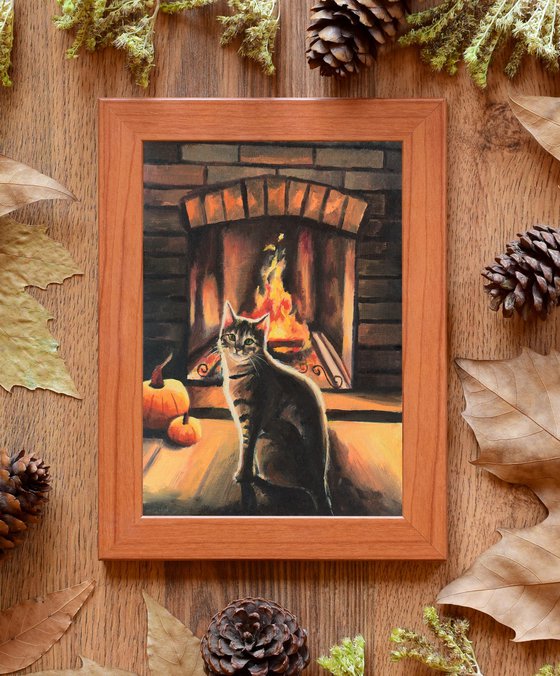 Cat in a cozy autumn fireplace