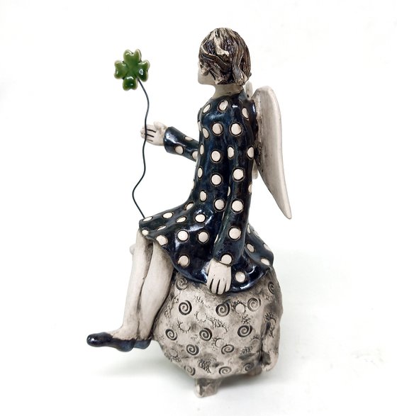 Whimsical Angel on Sheep