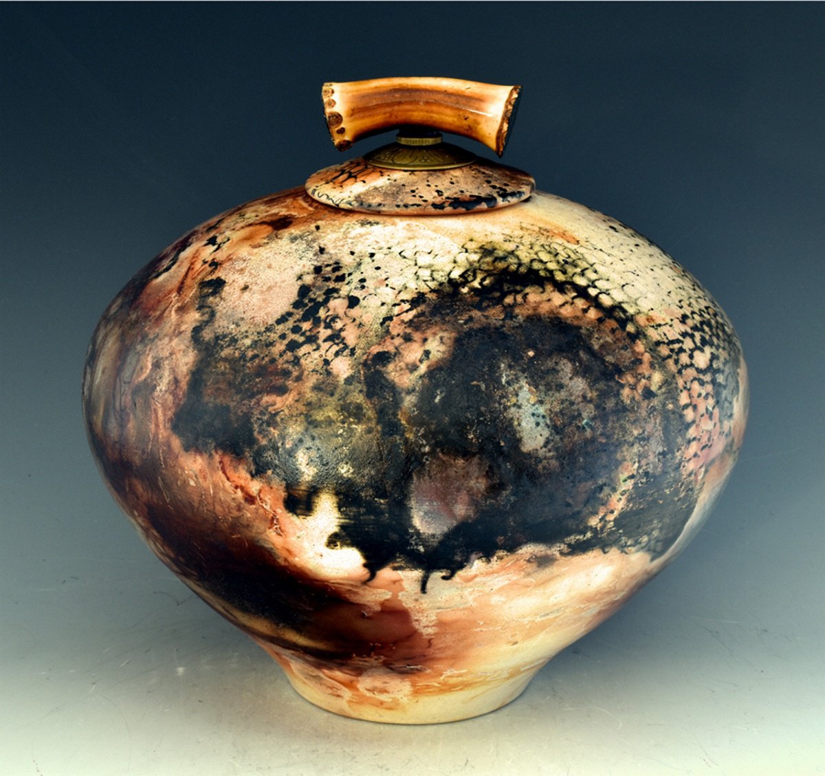 B175 sagger fired stoneware vessel by Ron Mello