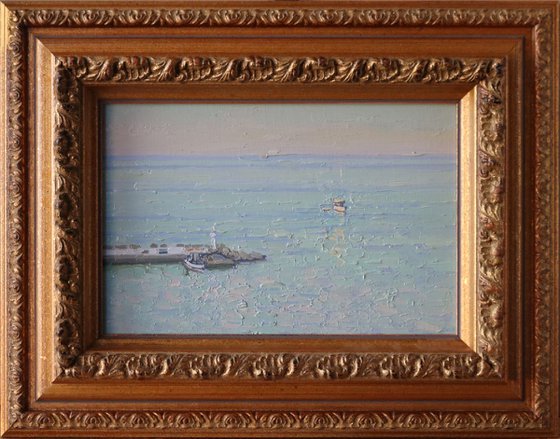 Sunset. The sea is calm. Bali. Crete. Greece