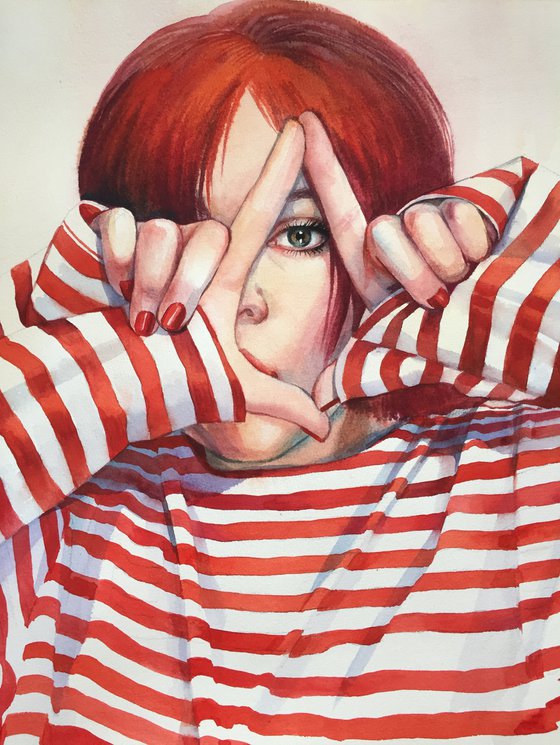 Girl in a striped sweater. Bright portrait of a girl.