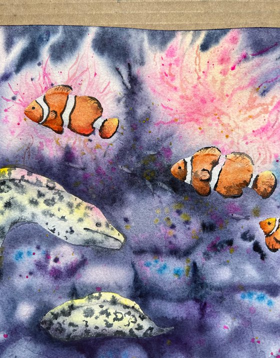 Set of two watercolor artworks. Underwater life of the coral reef. Fish Nemo and moray eels undersea.