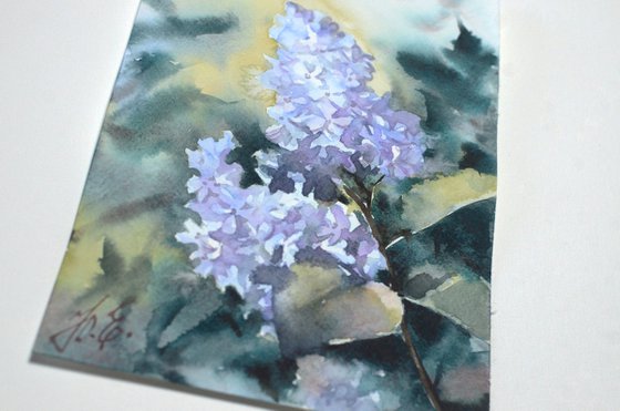 Small painting of lilac flowers in watercolor